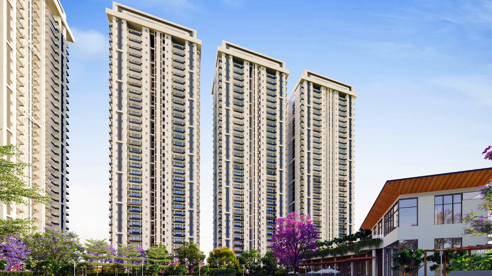 Tall modern buildings with blue sky and green trees in front