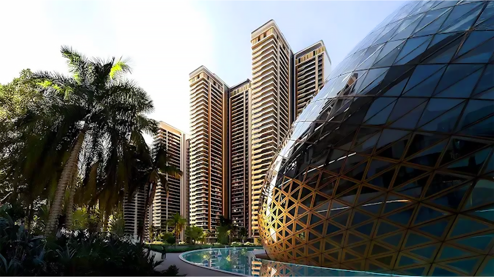 Tall modern buildings with blue sky and green trees in front